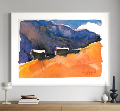 A framed watercolor painting titled 'Landschaft II' displayed on a wall above a wooden console table, featuring abstract landscape in blue and orange hues.